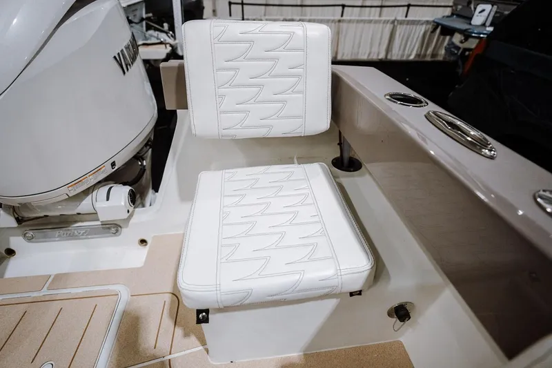 Slide: The Image of Manufacturer Provided Image: White seating on 2026 Parker 217 Explorer boat with Yamaha engine. - 22