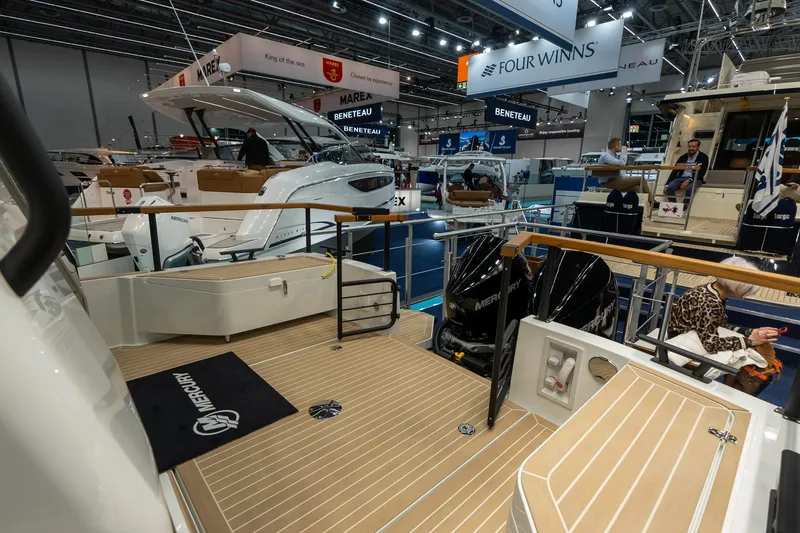 Slide: The Image of 2026 Targa 27.2 boat on water at sunset, showcasing sleek design and modern features. - 12