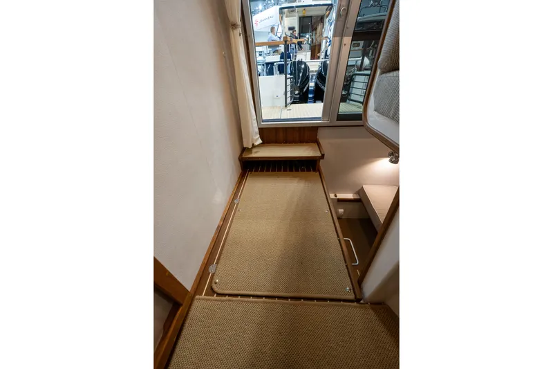 Slide: The Image of 2026 Targa 27.2 boat cruising at sunset on open water. - 14