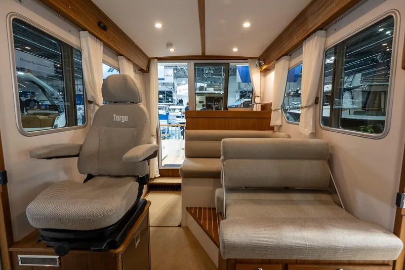 Slide: The Image of 2026 Targa 27.2 boat docked, featuring sleek design and dual engines. - 17