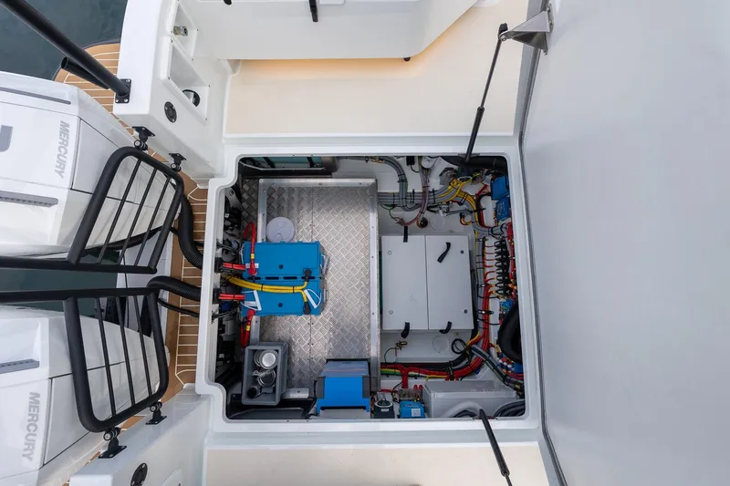Slide: The Image of Engine compartment of 2026 Targa 27.2 boat, showcasing wiring and components. - 83