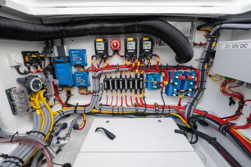 Slide: The Image of Electrical system of 2026 Targa 27.2 boat, featuring wiring and control panels. - 85