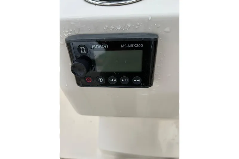 Slide: The Image of Fusion MS-NRX300 marine stereo on 2019 Grady-White Freedom 235 boat. - 18