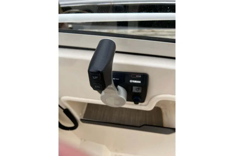 Slide: The Image of Throttle control of 2019 Grady-White Freedom 235 boat with Yamaha engine. - 19