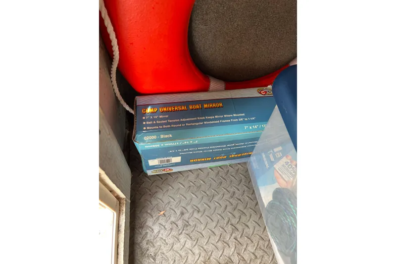 Slide: The Image of Box of a universal boat mirror on a Grady-White Freedom 235, 2019 model. - 25