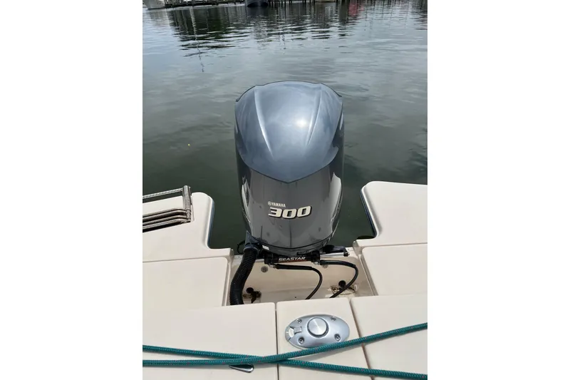Slide: The Image of 2019 Grady-White Freedom 235 boat with Yamaha 300 outboard motor on calm water. - 32