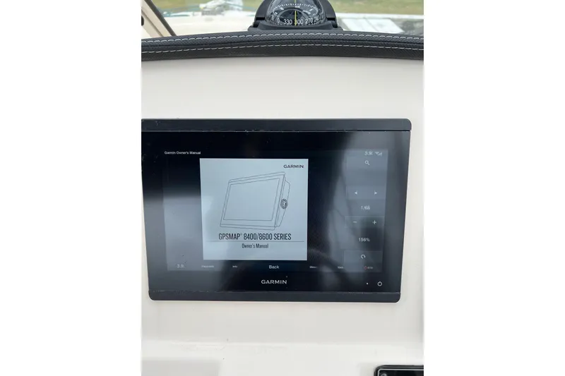 Slide: The Image of Garmin GPSMAP display on 2019 Grady-White Freedom 235 boat dashboard. - 33