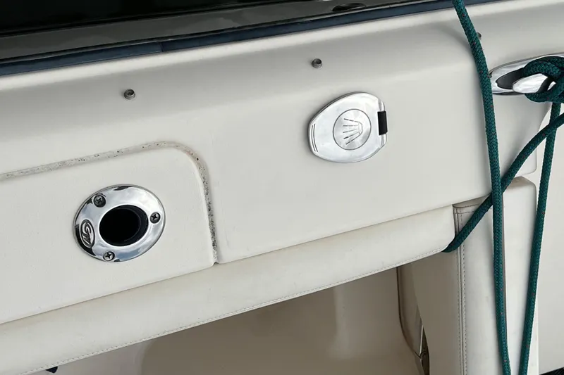 Slide: The Image of 2019 Grady-White Freedom 235 boat detail with chrome fittings and green rope. - 5