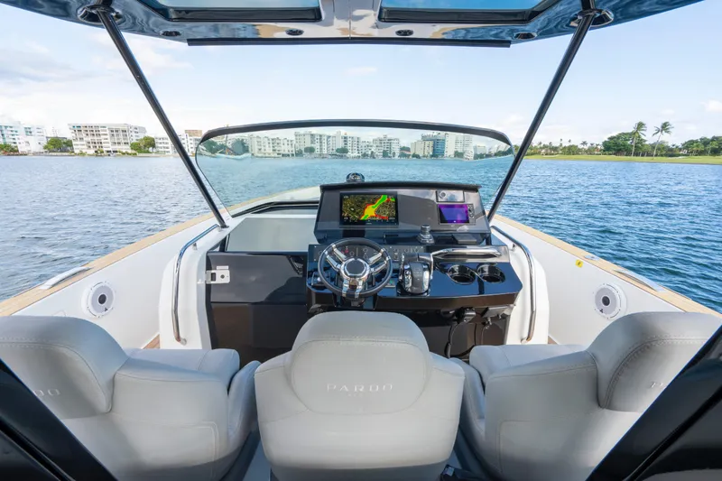 Slide: The Image of Cockpit view of 2021 Pardo Yachts 38, featuring modern navigation equipment and luxurious seating. - 29