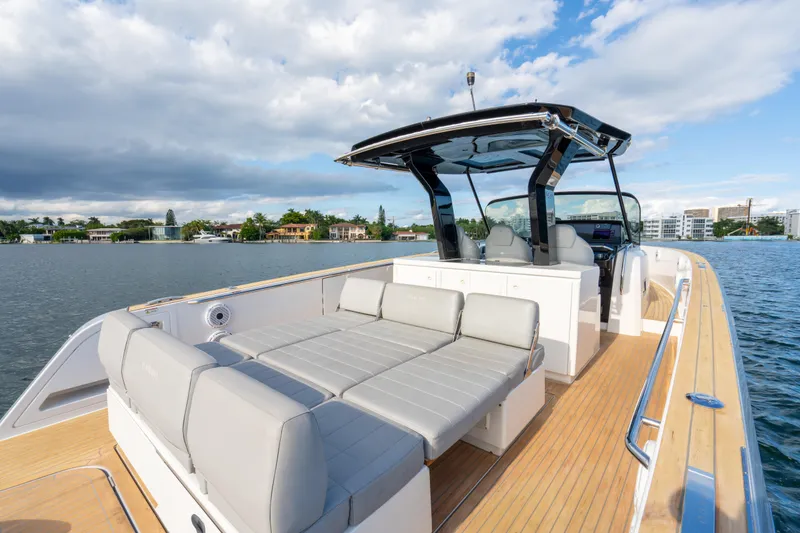 Slide: The Image of 2021 Pardo Yachts 38 on water, featuring spacious deck and modern seating. - 39