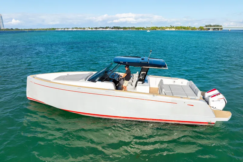 Slide: The Image of 2021 Pardo Yachts 38 cruising on clear blue water, showcasing sleek design and luxury features. - 6