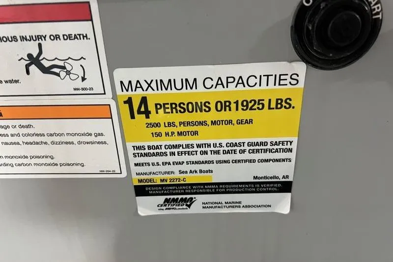 Slide: The Image of 2024 SeaArk 2272 MVT capacity label: 14 persons or 1925 lbs, 150 HP motor. - 9