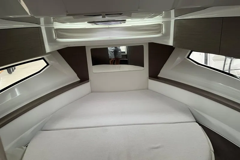 Slide: The Image of 2025 Jeanneau NC 895 Sport Series 2 cabin interior with modern design and comfortable bedding. - 27