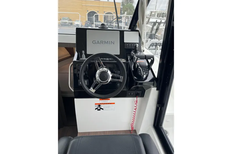 Slide: The Image of 2025 Jeanneau NC 895 Sport Series 2 helm with Garmin navigation system. - 36