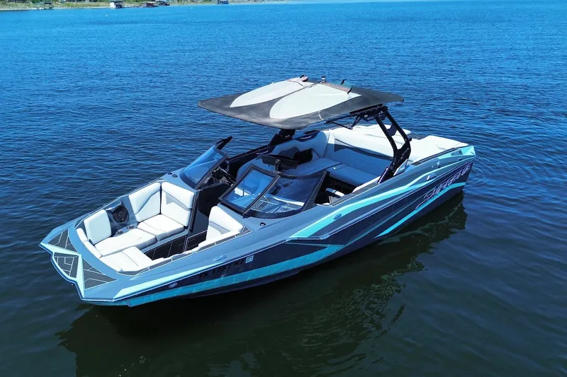 Slide: The Image of 2021 Supreme ZS232 boat on calm blue water, featuring sleek design and spacious seating. - 0