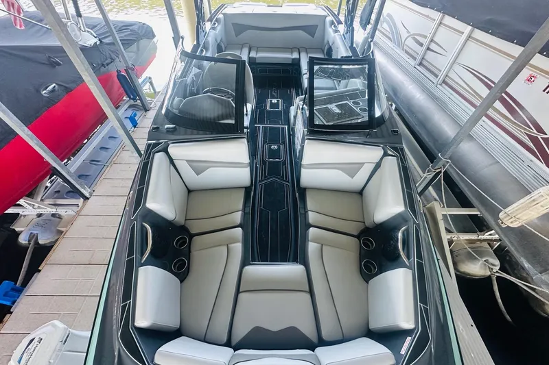 Slide: The Image of 2021 Supreme ZS232 boat interior with sleek seating and modern design. - 13