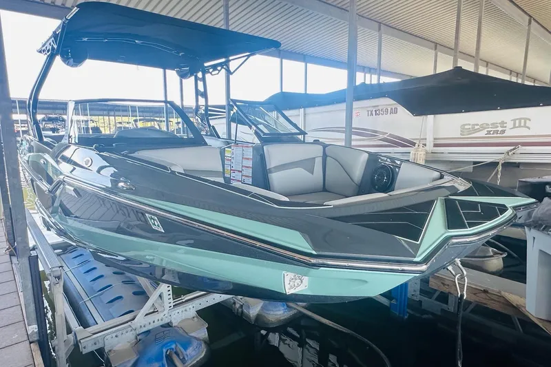Slide: The Image of 2021 Supreme ZS232 boat docked in a marina, showcasing sleek design and modern features. - 8