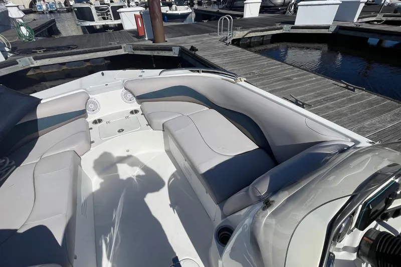 Slide: The Image of 2017 Hurricane SunDeck Sport 202 OB boat interior at marina dock. - 10