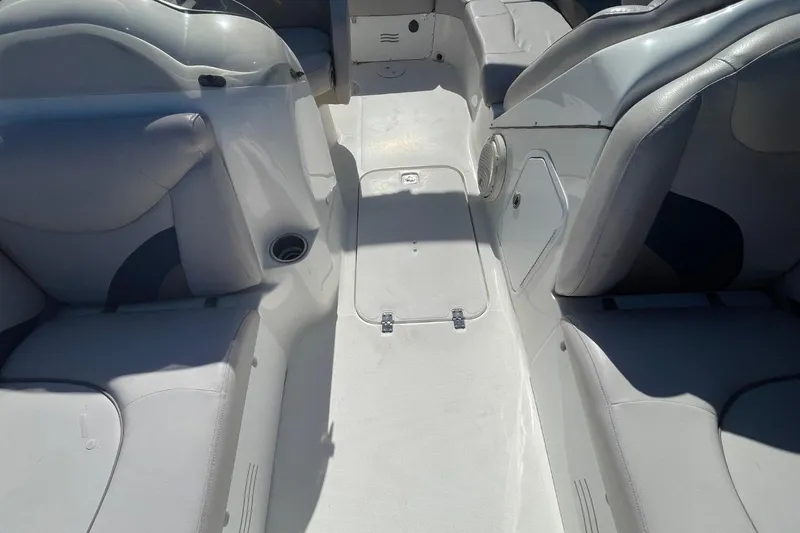 Slide: The Image of 2017 Hurricane SunDeck Sport 202 OB interior with spacious seating and storage compartments. - 14