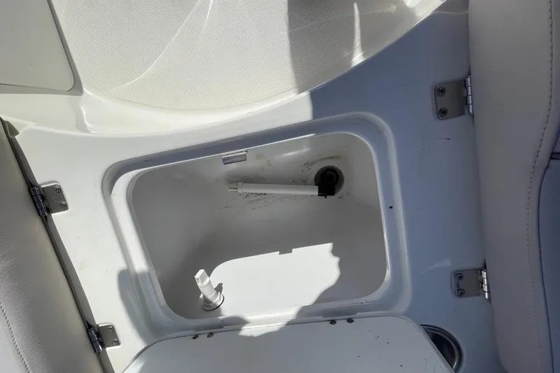 Slide: The Image of Open storage compartment in 2017 Hurricane SunDeck Sport 202 OB boat interior. - 27