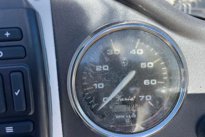 Slide: The Image of Close-up of a 2017 Hurricane SunDeck Sport 202 OB speedometer gauge. - 31