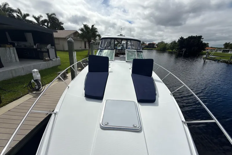 Slide: The Image of Overhead view of a 2009 Formula 37 Performance Cruiser docked at a pier. - 2