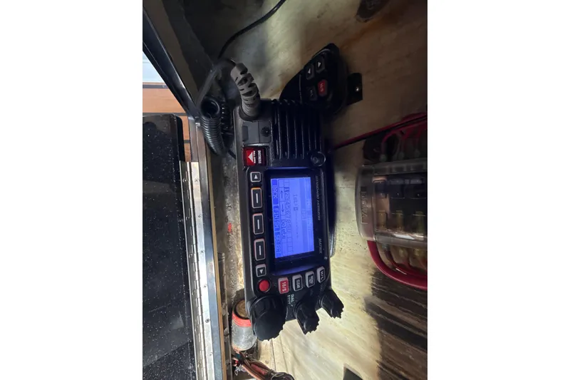 Slide: The Image of Dashboard of a 2009 Formula 40 Performance Cruiser with Garmin navigation displays. - 22