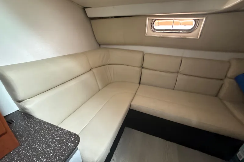 Slide: The Image of Luxurious interior of 2009 Formula 40 Performance Cruiser with curved seating and modern cabinetry. - 33