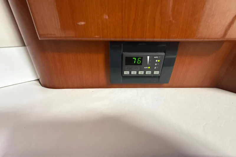 Slide: The Image of Open Panasonic microwave in a 2009 Formula 40 Performance Cruiser kitchen. - 37