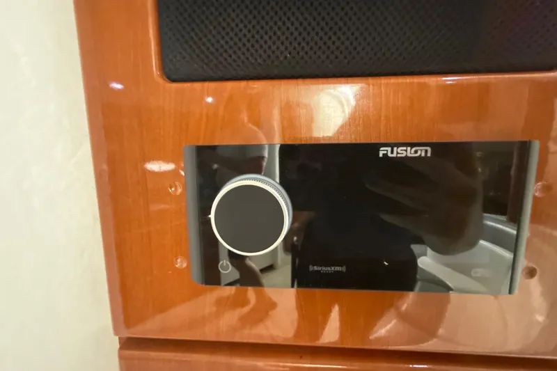 Slide: The Image of Digital control panel on 2009 Formula 40 Performance Cruiser, displaying temperature at 76 degrees. - 38