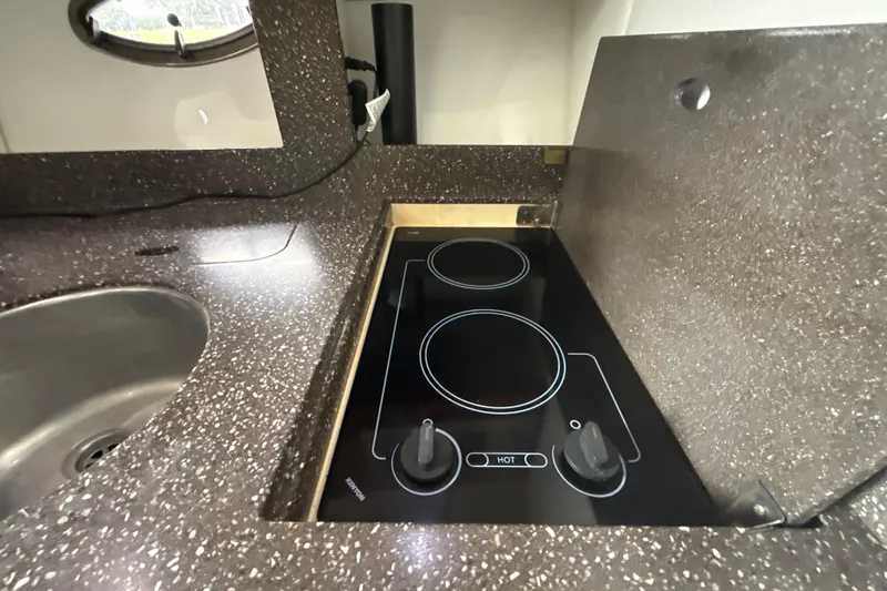 Slide: The Image of Fusion audio system on 2009 Formula 40 Performance Cruiser, featuring sleek wood paneling. - 39