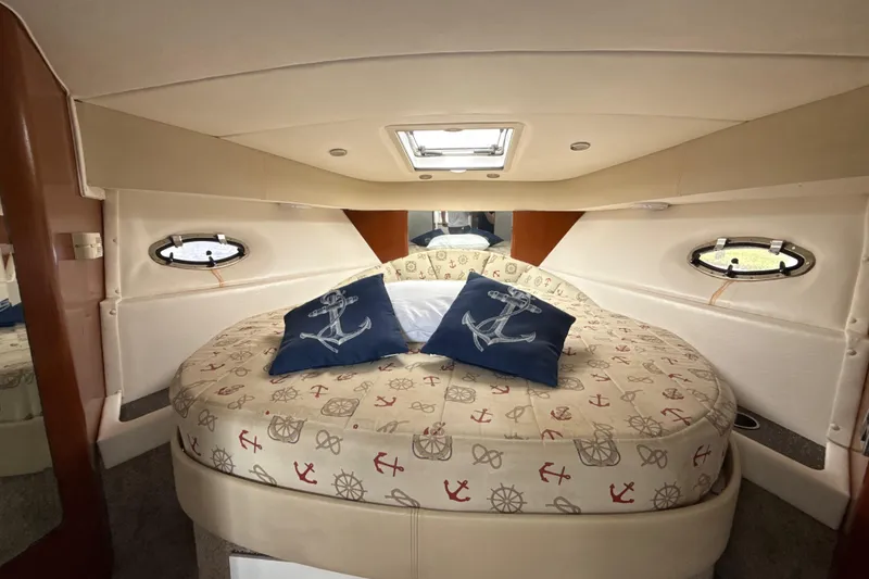 Slide: The Image of Interior of a 2009 Formula 40 Performance Cruiser with kitchenette and seating area. - 41