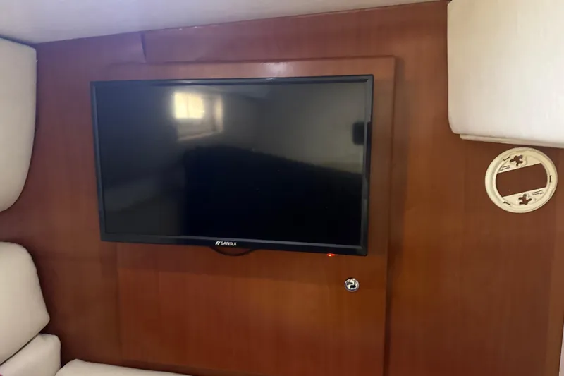 Slide: The Image of Engine compartment of a 2009 Formula 40 Performance Cruiser, featuring mechanical components. - 54