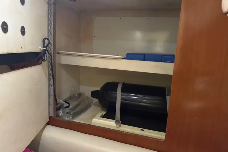 Slide: The Image of Flat-screen TV mounted on wooden wall inside 2009 Formula 40 Performance Cruiser. - 55