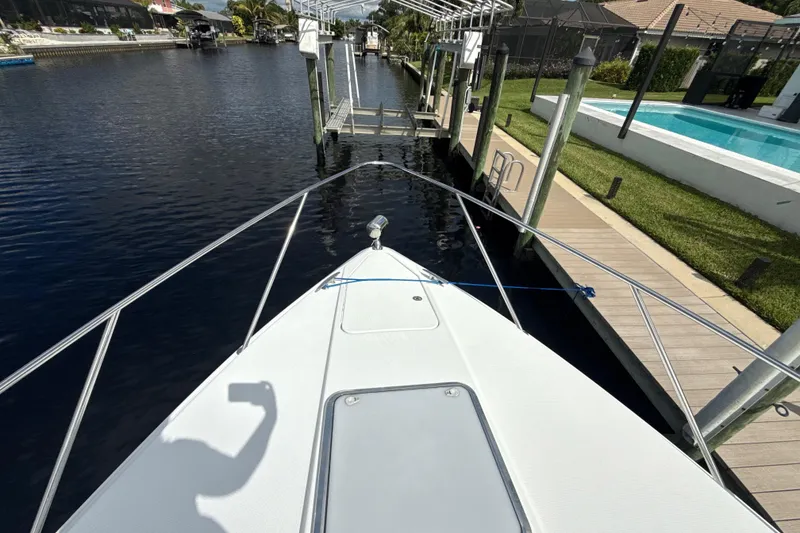 Slide: The Image of 2009 Formula 40 Performance Cruiser on a canal under cloudy skies. - 62