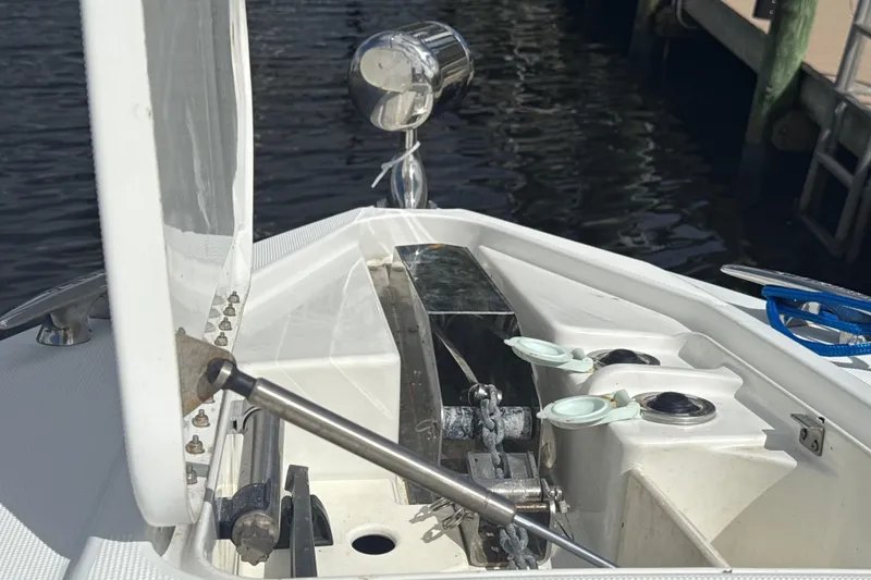 Slide: The Image of 2009 Formula 40 Performance Cruiser docked by a canal, sunny day, clear sky. - 64