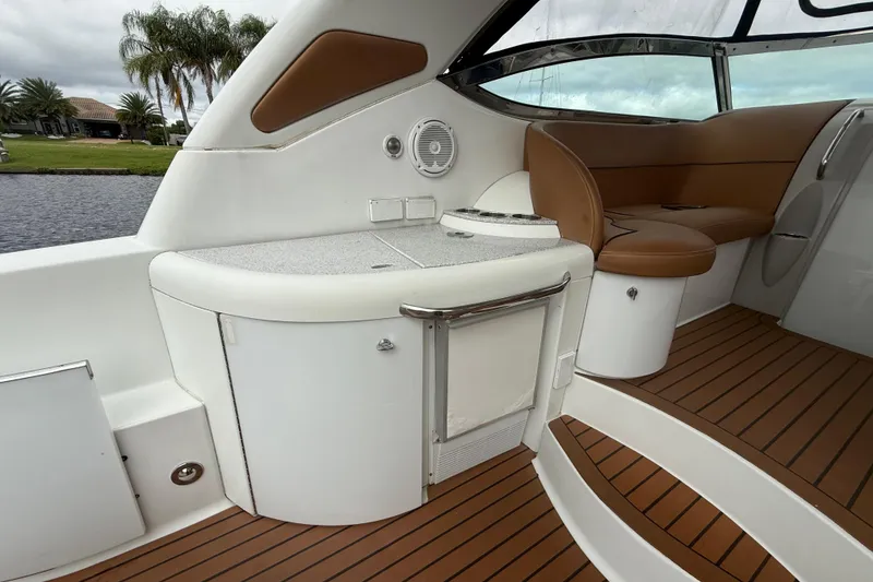 Slide: The Image of 2009 Formula 40 Performance Cruiser with brown leather seating and teak flooring. - 9