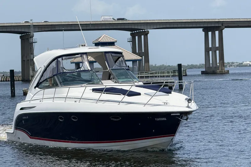 Slide: The Image of 2009 Formula 37 Performance Cruiser on water near a bridge. - 76
