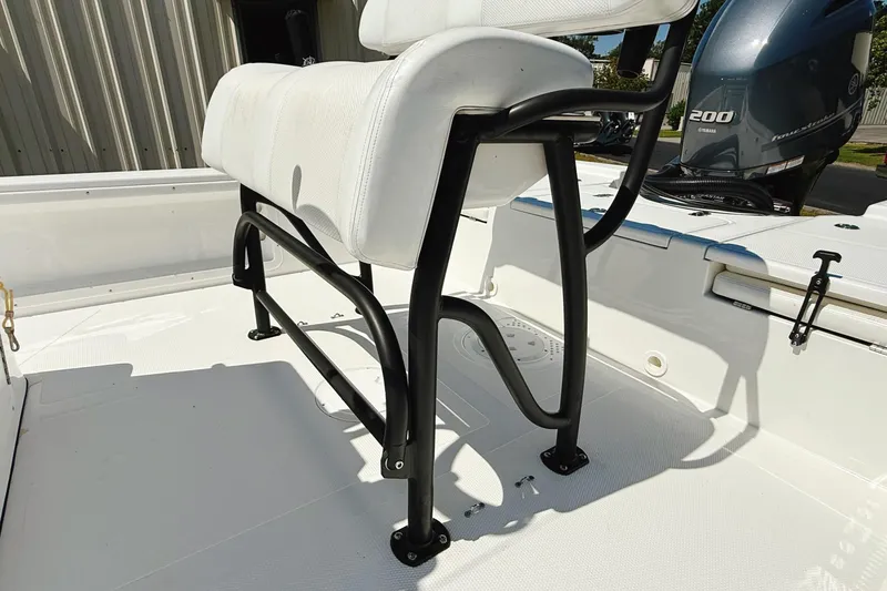 Slide: The Image of 2023 Frontier 2104 boat on trailer, close-up of hull and light. - 19