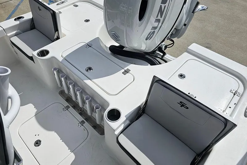 Slide: The Image of 2026 Sea Pro 210 Bay boat interior with seating and storage compartments. - 12