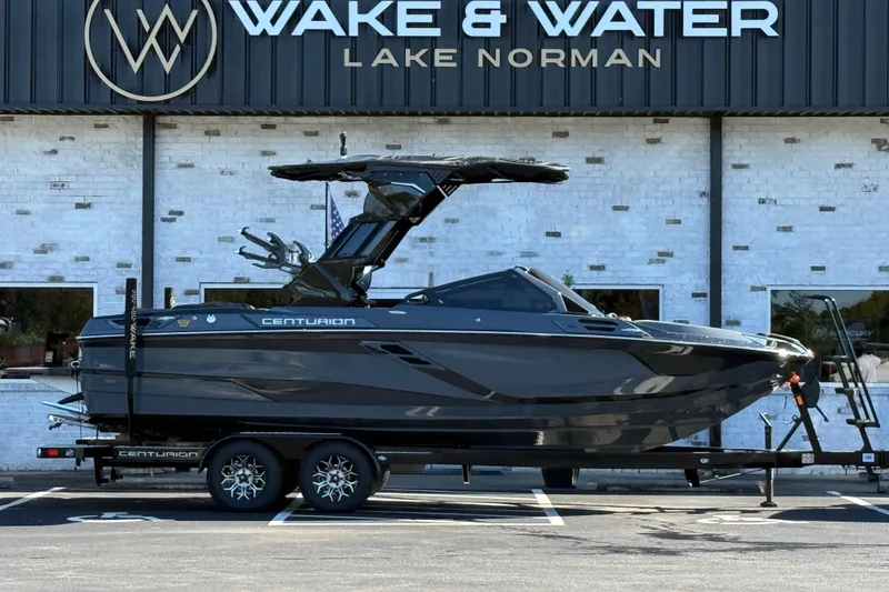 Slide: The Image of 2026 Centurion Ri230 boat on trailer at Wake & Water Lake Norman dealership. - 0