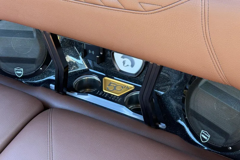 Slide: The Image of Centurion Ri230 2026 interior with brown leather seats and premium audio system. - 19