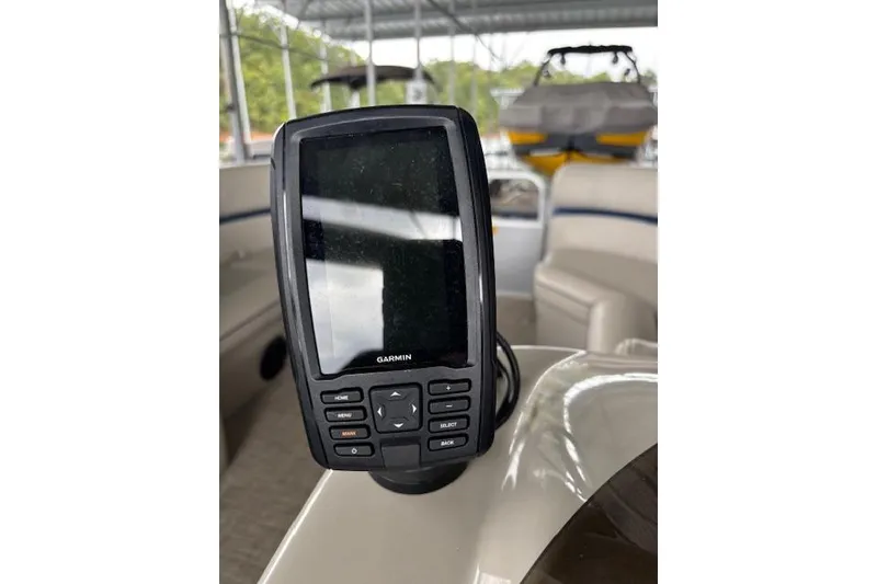 Slide: The Image of Garmin GPS device on 2017 South Bay 222 RS boat dashboard. - 25