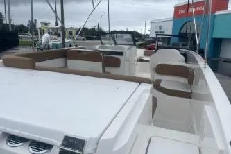 Slide: The Image of 2022 Bayliner VR6 Bowrider OB boat with spacious seating and modern design. - 6