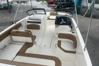 Slide: The Image of 2022 Bayliner VR6 Bowrider OB with spacious seating and modern design. - 7