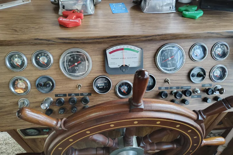 Slide: The Image of Wooden boat dashboard with gauges and controls, Lazy Days 50, 1981 model. - 24