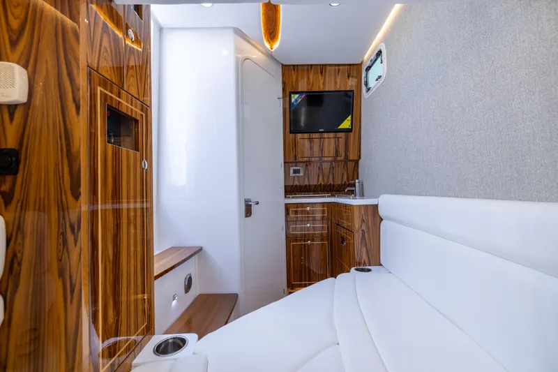 Slide: The Image of Luxurious interior of 2026 HCB 42 Lujo yacht with wood accents and modern amenities. - 21