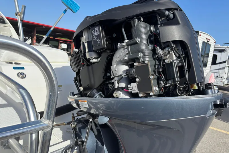 Slide: The Image of 2016 Carolina Cat 230 DC boat engine close-up, showcasing intricate mechanical details. - 5