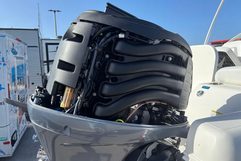 Slide: The Image of 2016 Carolina Cat 230 DC boat engine close-up, showcasing intricate mechanical details. - 6