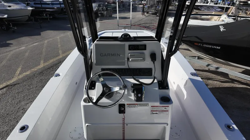 Slide: The Image of 2026 Twin Vee 22 Bay Cat boat console with Garmin navigation system. - 13